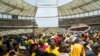 African National Congress supporters listen to South African President Cyril Ramaphosa at the Mose Mabhida stadium in Durban, South Africa, Feb. 24, 2024, during their national manifesto launch in anticipation of the 2024 general elections. 