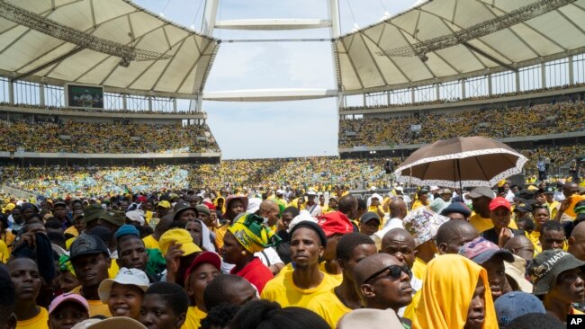African National Congress supporters listen to South African President Cyril Ramaphosa at the Mose Mabhida stadium in Durban, South Africa, Feb. 24, 2024, during their national manifesto launch in anticipation of the 2024 general elections.