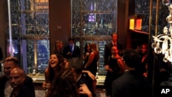 FILE -- Guests at the Rainbow Room at at 30 Rockefeller Plaza in New York City. 