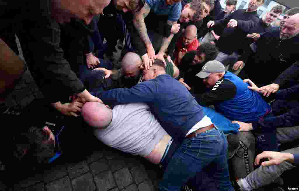 People participate during the annual Sedgefield Ball Game played traditionally on Shrove Tuesday in Sedgefield, Britain.