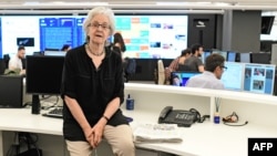 FILE - Soledad Gallego-Diaz, then the editor-in-chief of the Spanish daily newspaper El Pais, is seen in a newsroom in Madrid, July 3, 2018
