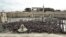 People attend the Angelus prayer led by Pope Francis from his window, at the Vatican, Nov. 12, 2023. (Vatican Media/­Handout via Reuters) 