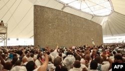 Muslim pilgrims perform the symbolic 'stoning of the devil' ritual as part of the hajj pilgrimage in Mina, near Saudi Arabia's holy city of Mecca, June 16, 2024. 