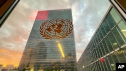 FILE - The United Nations headquarters building is seen from inside the General Assembly hall, on Sept. 21, 2021. 