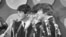 FILE - The Beatles address the media in the press room of Kennedy International Airport on their arrival, Feb. 7, 1964 in New York. 
