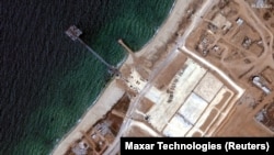 资料照片：Maxar Technologies卫星图像显示美军运作的加沙人道主义救援码头在移开之前的状态。(2024年6月12日)