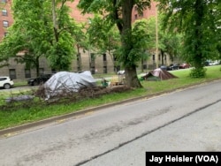 A tent encampment of the unhoused in Halifax, Canada, on the grounds of a downtown hospital near Dalhousie University campus.