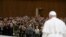 Pope Francis attends a meeting with the faithful of parishes from Rho at the Vatican, March 25, 2023. (Vatican Media/­Handout via Reuters) 