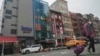 Gedung enam lantai dengan tembok kaca di kawasan Chinatown kota New York, dipercaya sebagai kantor polisi luar negeri China.