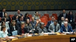 Linda Thomas-Greenfield, United States Ambassador to the United Nations, center front, votes against a resolution concerning a ceasefire in Gaza during a Security Council meeting at United Nations headquarters, Feb. 20, 2024.