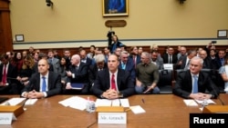 Former military officials Ryan Graves, David Grusch, and David Fravor attend a hearing on unidentified anomalous phenomena on Capitol Hill in Washington, July 26, 2023. 