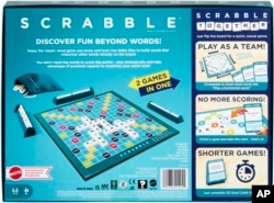 This photo provided by Mattel shows the new version of the board game Scrabble, that includes a new version called Scrabble Together. (Mattel via AP)