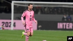 Inter Miami's Lionel Messi controls the ball during the friendly soccer match between Vissel Kobe and Inter Miami CF at the National Stadium, Feb. 7, 2024, in Tokyo. 