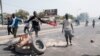 Protesters set up road blocks on a main road in Dakar, Senegal, March 30, 2023.