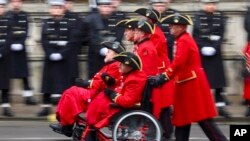 Chelsea pensioners attend the annual Remembrance Sunday ceremony at the Cenotaph in London.