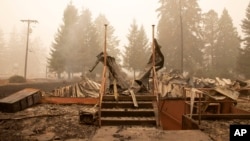 FILE - This Sept. 13, 2020, file photo shows what remains of the Oregon Department of Forestry, North Cascade District Office, after it was destroyed by a wildfire, in Lyons, Oregon.