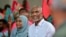 Maldives' main opposition candidate Mohamed Muiz participates in a rally as he concludes his campaign for the second round of presidential election in capital of Male, Sept.29, 2023. 