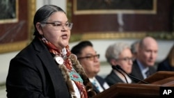 Corrine Sams of the Confederated Tribes of the Umatilla Indians speaks during a ceremony in Washington, Feb. 23, 2024. The Biden administration, four tribes and two governors launched a plan to help salmon populations recover in the Pacific Northwest.