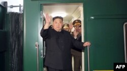 This picture taken on Sept. 10, 2023 and released from North Korea's official Korean Central News Agency (KCNA) on Sept. 12, 2023 shows North Korea's leader Kim Jong Un waving as he departs by train from Pyongyang. (AFP photo/KCNA via KNS)