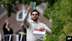 Protester Salwan Momika appears outside the Iraqi Embassy in Stockholm, July 20, 2023, where he plans to burn a copy of the Quran and the Iraqi flag.