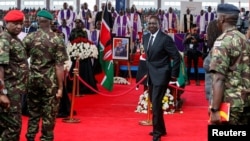 Kenya's President William Ruto attends the military honours and memorial service to Kenya's military chief, General Francis Ogolla, who was killed in a military helicopter crash, at the Ulinzi Sports Complex in Langata district of Nairobi, Kenya April 20, 2024. 