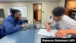 Antonio Davis, left, studies with a classmate in Chattahoochee Valley Community College's new advising center, Feb. 23, 2023, in Phenix City, Ala. (Rebecca Griesbach/Press-Register via AP)