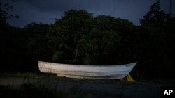 FILE - A traditional boat known as a pirogue is seen in Trinidad and Tobago, Jan. 18, 2022.