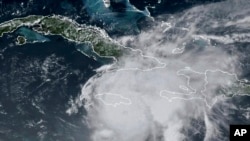 This GOES-East GeoColor satellite image taken at 1:20 p.m. EDT, and provided by NOAA, shows Hurricane Beryl moving towards Jamaica, July 3, 2024.