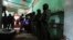 FILE - Police and soldiers conduct a joint operation searching for drugs and weapons in a neighborhood of Duran, Ecuador, Feb. 1, 2024. On Jan. 8, President Daniel Noboa declared a national state of emergency due to a wave in crime.