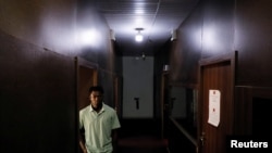 Emmanuel Gbeve-Hailord, 27, a Ghanaian LGBTQ rights activist and student, is photographed at his university in Accra, Ghana on January 22, 2024.