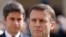 Presiden Prancis Emmanuel Macron (depan) dan Perdana Menteri Gabriel Attal menghadiri sebuah upacara di Paris, pada 20 Maret 2024. (Foto: Ludovic Marin, Pool via AP)
