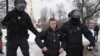 Russian Authorities Detain Mourners Paying Tribute to Navalny