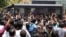 FILE PHOTO: A police van transports some of those convicted in connection with a riot in Gujarat in 2002, outside a court after a ruling in Ahmedabad, India June 2, 2016. 