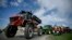 Farmers drive their tractors during an action to block trucks crossing the Danube bridge, marking the border between Bulgaria and Romania in a protest against the duty-free import of grain coming from Ukraine into the EU, in Rousse, Bulgaria, on March 29, 2023. 