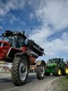 Farmers drive their tractors during an action to block trucks crossing the Danube bridge, marking the border between Bulgaria and Romania in a protest against the duty-free import of grain coming from Ukraine into the EU, in Rousse, Bulgaria, on March 29, 2023. 