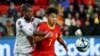 China Edges Haiti 1-0 to Keep World Cup Hopes Alive 