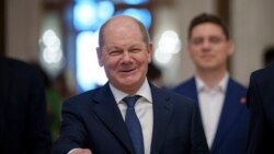 Germany’s Scholz visits China amid tensions over EVs, Russia.