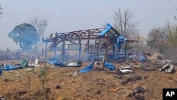 FILE - This photo provided by the Kyunhla Activists Group shows the aftermath of an airstrike in Pa Zi Gyi village, in Sagaing Region's Kanbalu Township, Myanmar, April 11, 2023.