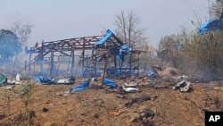 This photo provided by the Kyunhla Activists Group shows aftermath of an airstrike in Pa Zi Gyi village in Sagaing Region's Kanbalu Township, Myanmar, April 11, 2023. 