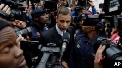 FILE - Oscar Pistorius leaves the High Court in Pretoria, South Africa, June 14, 2016, during his trial for the murder of girlfriend Reeva Steenkamp. He will have a parole hearing on Nov. 24, 2023. 