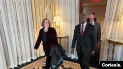 FILE— In an undated photo, U.S. assistant secretary of state for African affairs, Molly Phee with Tete Antonio, Minister of External Relations.