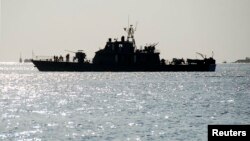 FILE - An Iranian navy warship arrives to dock at Port Sudan in the Red Sea state, Dec. 8, 2012. Iran's warship Alborz has entered the Red Sea, a news agency reported Jan. 1, 2024.