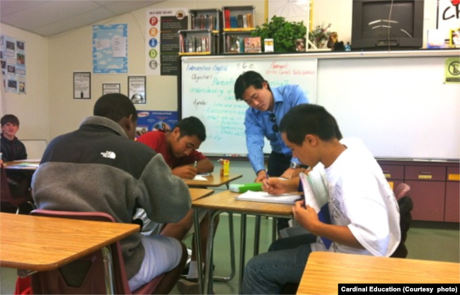 Allen Koh, the founder of Cardinal Education in California, works with students to help get them ready for applying to college. (Courtesy photo)