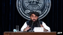 Taliban spokesman Zabihullah Mujahid speaks during a press conference in Kabul, Afghanistan, July 3, 2024, following the third Doha meeting. 