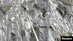 A detailed view of the Batagaika crater, as permafrost thaws causing a mega-slump in the eroding landscape, in Russia's Sakha Republic in this image from video taken July 11 or 12, 2023.