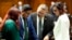 From left, Democratic Arizona Reps. Melody Hernandez, Oscar De Los Santos, Lupe Contreras and Nancy Gutierrez confer, April 17, 2024, at the Capitol in Phoenix. House Republicans again blocked an effort to repeal a near-total ban on abortions.