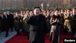 FILE - North Korean leader Kim Jong Un and his daughter Kim Ju Ae visit the Ministry of National Defense in Pyongyang, North Korea, in this picture released on Feb. 9, 2024 by the Korean Central News Agency.