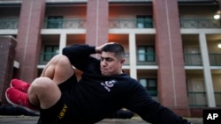 Army Staff Sgt. Daniel Murillo in physical training at Ft. Bragg on Wednesday, Jan. 18, 2023, in Fayetteville, North Carolina (AP Photo/Chris Carlson)