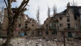 A residential building damaged by a Russian military strike is seen in the front-line city of Avdiivka, in Donetsk region, Ukraine, March 20, 2023.