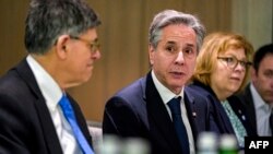 US Secretary of State Antony Blinken speaks during a meeting with former Israeli army chief of staff Gadi Eisenkot and former Israeli Defense Minister Benny Gantz, both members of the current Israeli five-person war cabinet in Tel Aviv on February 8, 2024.